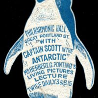 Great Britain - poster stamp c.1913 - embossed and die-cut in the shape of a penguin - was produced to publicize British photographer Herbert Ponting's lectures on his experiences and photographic record of his experiences as part of Captain Robert Falcon Scott's Terra Nova exploration of Antarctica in 1911.